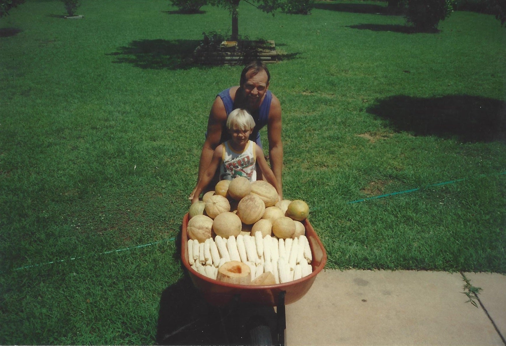The Story of Gro-Rite Garden - Dad with abundant crop