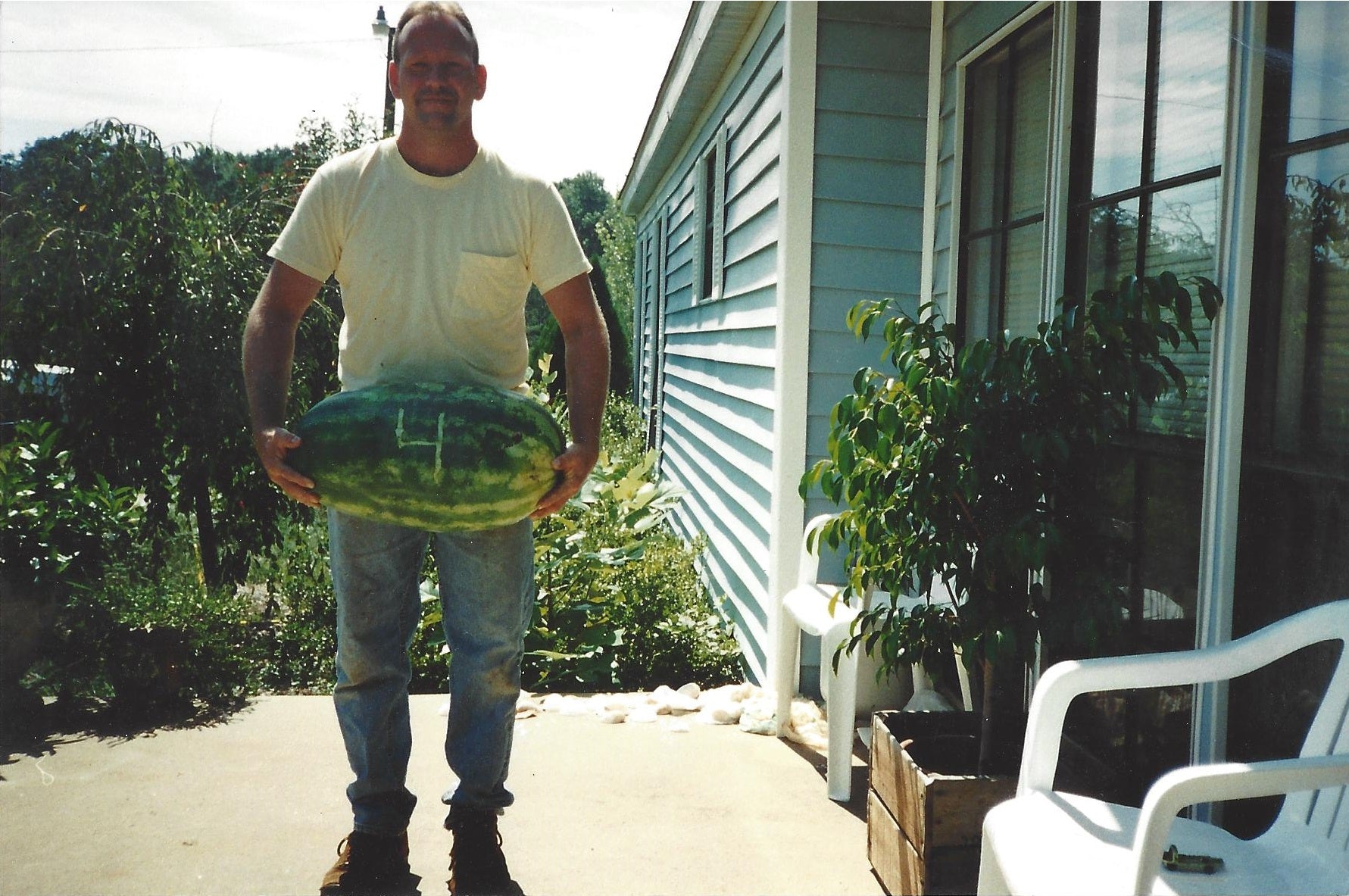 The Story of Gro-Rite Garden - Dad with a giant watermelon